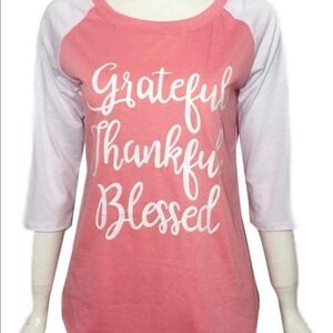 Ragland style coral color blessed top